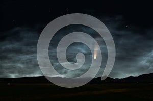 Comet astoid meteor shooting star over rural mountain landscape photo