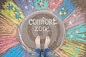 Comfort zone concept. Feet standing inside comfort zone circle.