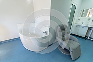 Comfortable bath in new modern maternity ward. Stylish ward in hospital.
