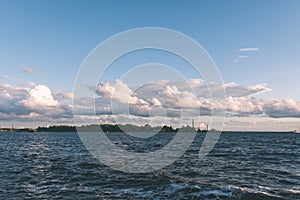 comfortable beach of the baltic sea with rocks and green vegetat