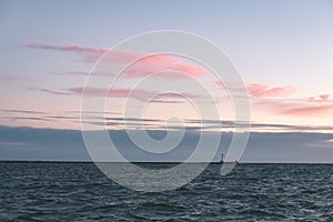 comfortable beach of the baltic sea with rocks and green vegetat