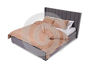 Comfortable gray bed with beige linens on white background