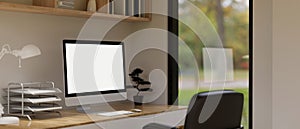 Comfortable home office workplace interior in white and wood style with pc desktop computer