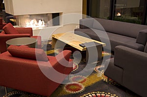 Comfortable hotel lobby with fireplace