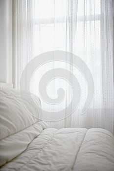 Comfortable mattress cover on a bed room