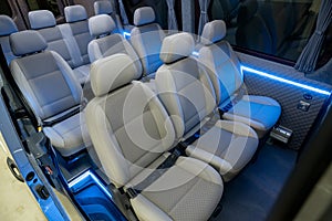 Comfortable passenger bus interior with upholstered seats