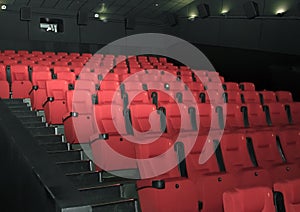 Comfortable red seats with numbers in moderncinema