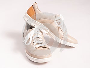 Comfortable sneakers made of beige genuine leather