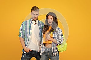 Comfortable and trusting dating relationship. Heterosexual dating couple yellow background. Sexy girlfriend and