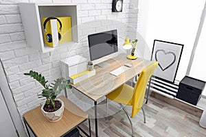 Comfortable workplace with computer on desk