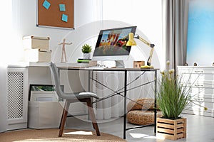 Comfortable workplace with modern computer. Home office