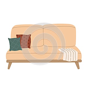 Comfortable yellow sofa with cosy red and green pillow