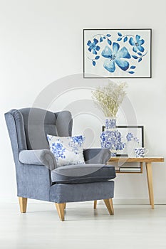 Comfy armchair in white room