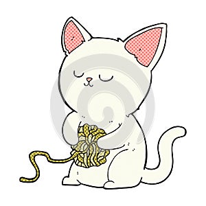 comic cartoon cat playing with ball of yarn