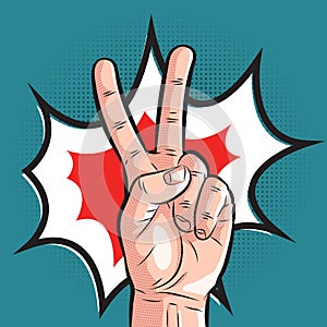 Comic hand showing victory gesture. pop art peace sign on halftone background