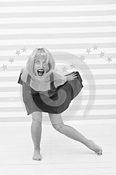 Comic and humorous concept. Woman playful mood having fun. Fun and entertainment. Girl bob wig posing striped background