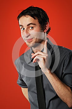 Comic young man on red