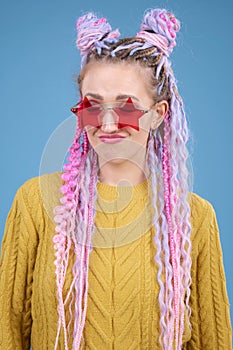 comical humorous woman wearing funny glasses star shaped demonstrates fun, joy