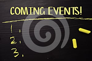 Coming Events! written with color chalk. Supported by an additional services. Blackboard concept