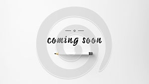 Coming soon announcement with pencil on white background