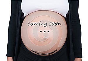 Coming soon. Cropped image of pregnant woman