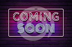 Coming soon glowing purple violet neon text on brick wall