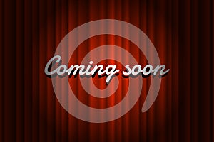 Coming soon handwrite title on closed red silky luxury theater curtain background with spotlight beam illuminated