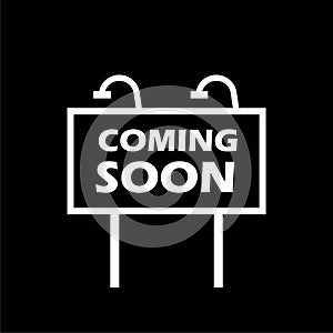 Coming soon sign isolate on dark background