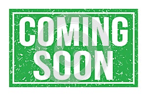 COMING SOON, words on green rectangle stamp sign