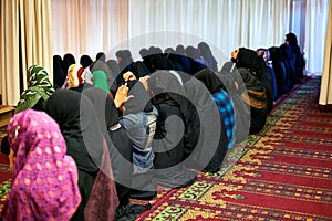 Coming together in worship. women worshipping in a mosque.