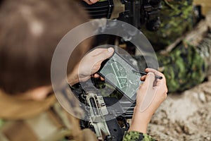 Commander of the Rangers paves the route on an electronic satnav