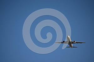 Commercial Airplane Flying Upwards