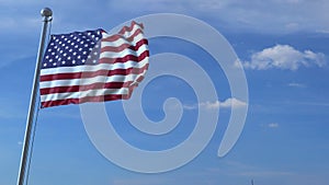 Commercial airplane landing behind waving American flag