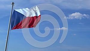 Commercial airplane landing behind waving Czech flag