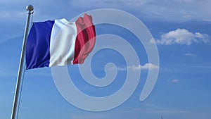 Commercial airplane landing behind waving French flag
