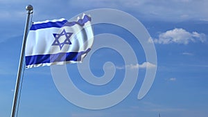 Commercial airplane landing behind waving Israeli flag