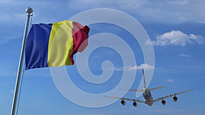Commercial airplane landing behind waving Romanian flag. Travel to Romania conceptual 3D rendering