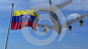 Commercial airplane landing behind waving Venezuelan flag. Travel to Venezuela conceptual 3D rendering