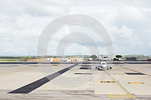Commercial airplane on parking strip at airport