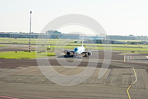 Commercial airplane on the runway on Schiphol, Netherlands