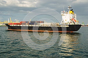 Commercial cargo ship full containers at port. Shipping,Transportation concept