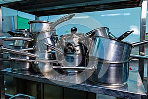 Commercial cooking equipment in restaurant. Industry steel kitchen workplace.