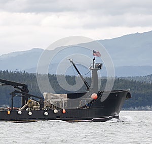 Commercial crab fishing vessel near Juneau, Alaska