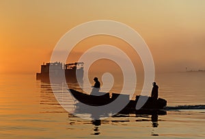 Commercial Fishermen at Sunset