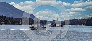 Commercial fishing boats sailing in Sitka, Alaska
