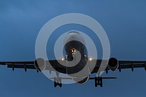 Commercial jet airliner in flight at night