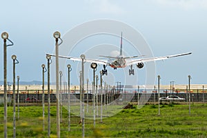 Commercial jet airliner landing at airport