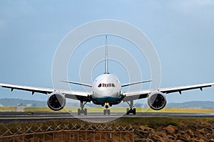 Commercial jet airliner on the runway in front view