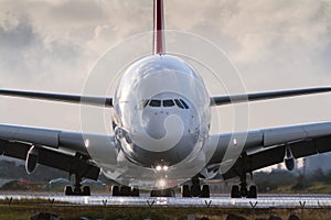 Commercial jet airliner on the runway in front view