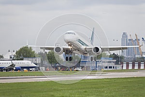 Commercial Jet Airplane Landing on an Airport Runway